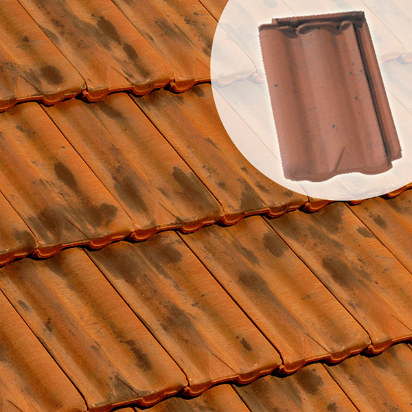 Tuile en terre cuite - Delta 10 Ste Foy - emboîtement grand moule faiblement galbée à relief - Vieilli nuancé sur fond rouge