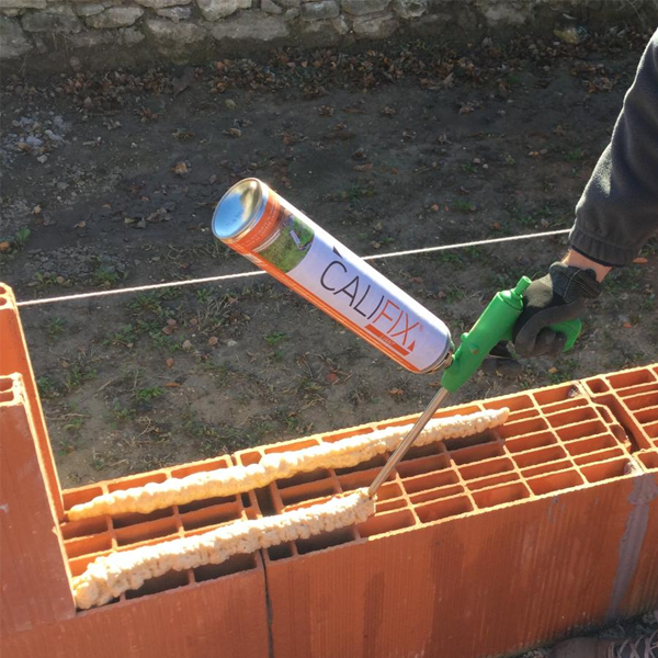 Liant prêt à l'emploi Terreal Califix pistolable pour brique rectifiée Calibric - cartouche de 810 mL