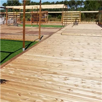 Lame de terrasse bois en Pin du Nord lisse - Classéo + - Bois qualité US - Traité classe 4 vert - 145 MM x 27,00 MM - Longueur 3,90 M